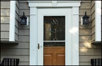 Traditional shake siding with decorative front door surround flutted molding in Randolph, NJ