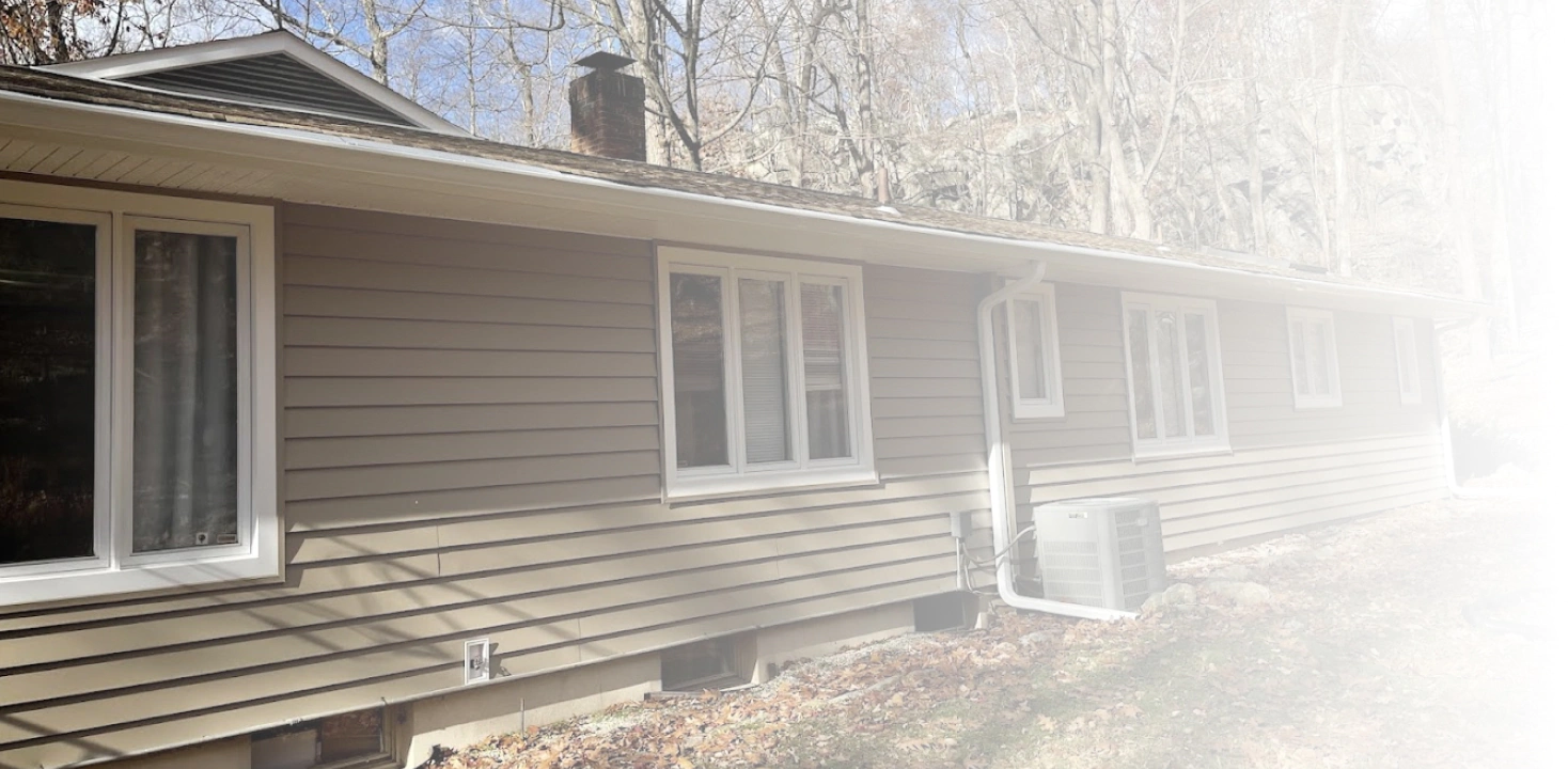 new siding installed in a bungalow house